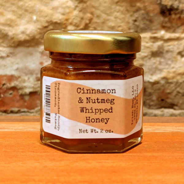 A sealed jar of Cinnamon & Nutmeg Whipped Honey.