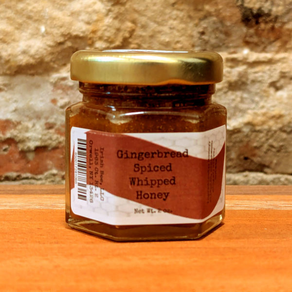 A sealed jar of Gingerbread Spiced Whipped Honey.