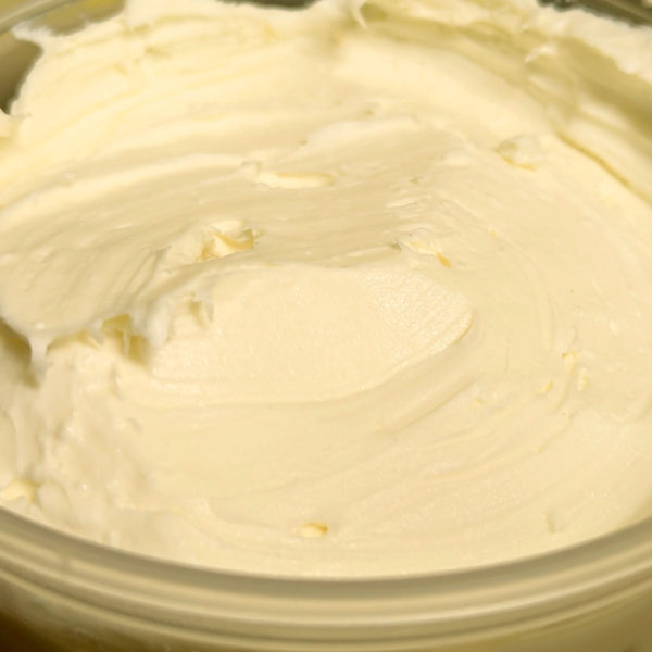 A closeup of New York Creme Cheese in the container.