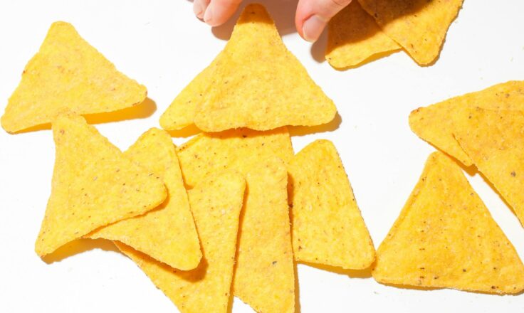 Person Getting a Piece of Chip.