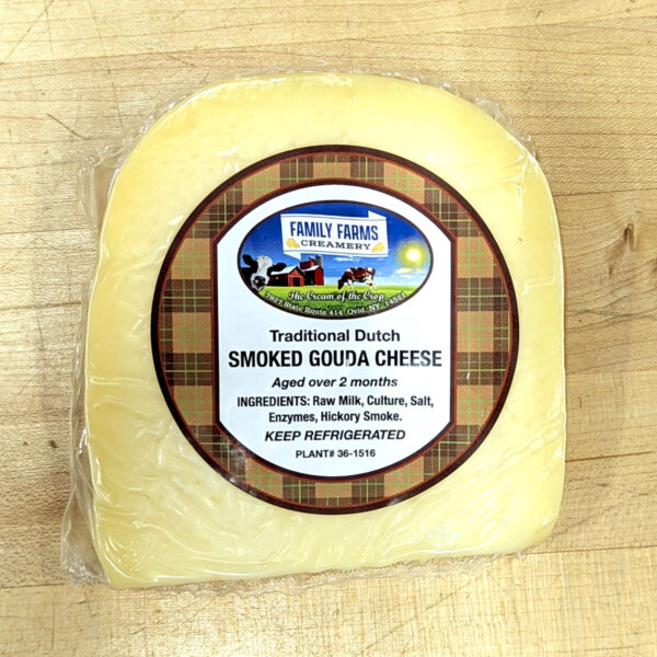 A wedge of Smoked Gouda Cheese.