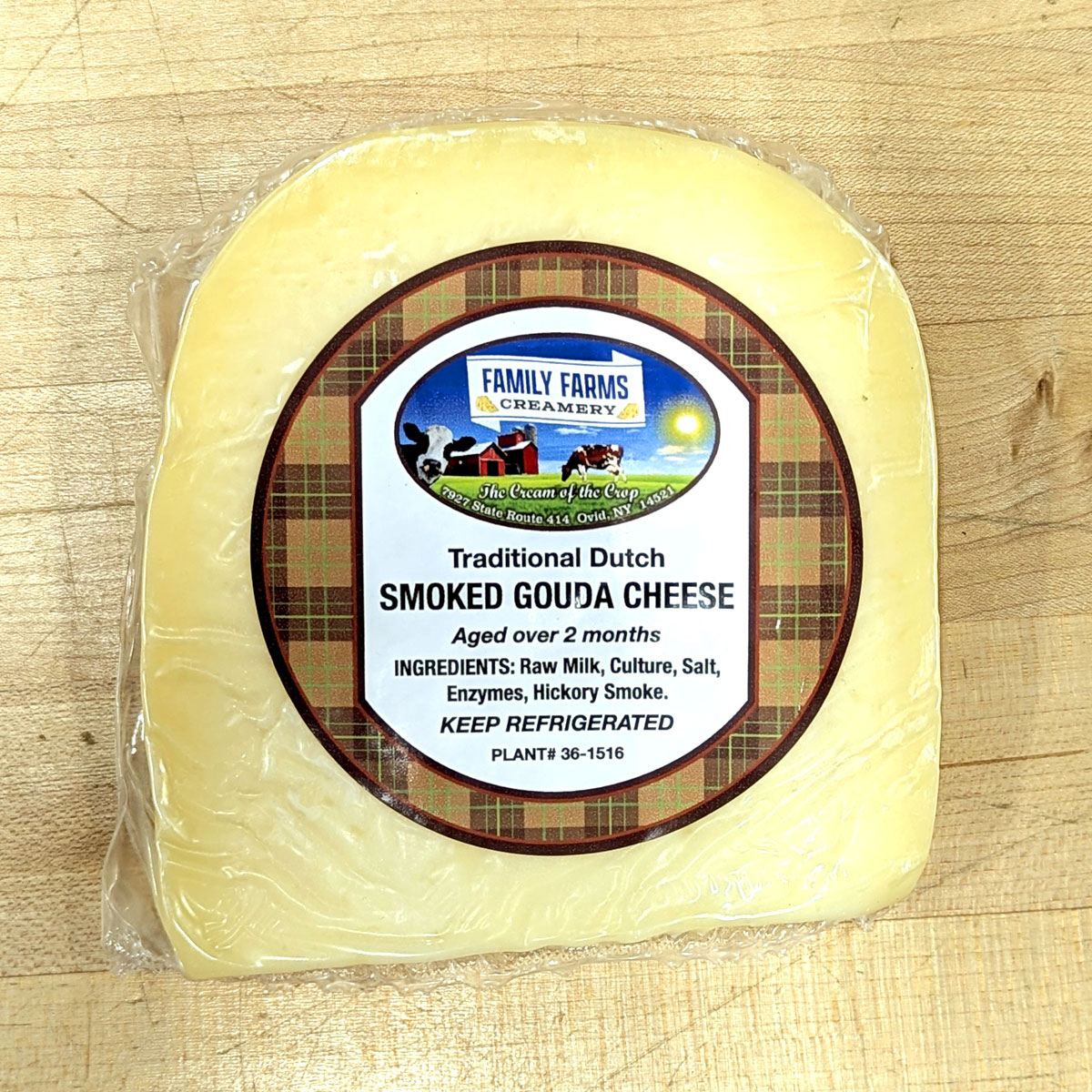 A wedge of Smoked Gouda Cheese.