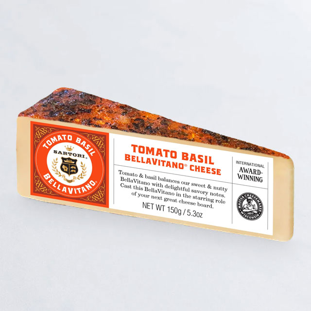 A wedge of Tomato Basil BellaVitano cheese.